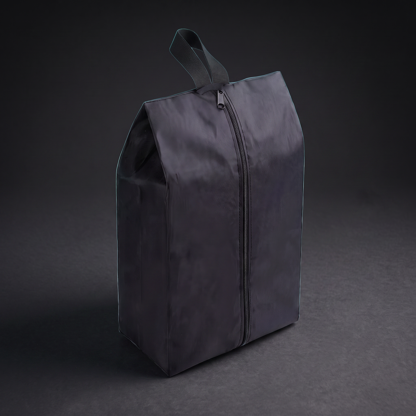Sac à chaussures Voyra — vue trois quarts avec reflet